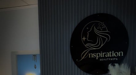Inspiration Art Nails Aruba logo displayed on a stylish wall in Oranjestad, AW.