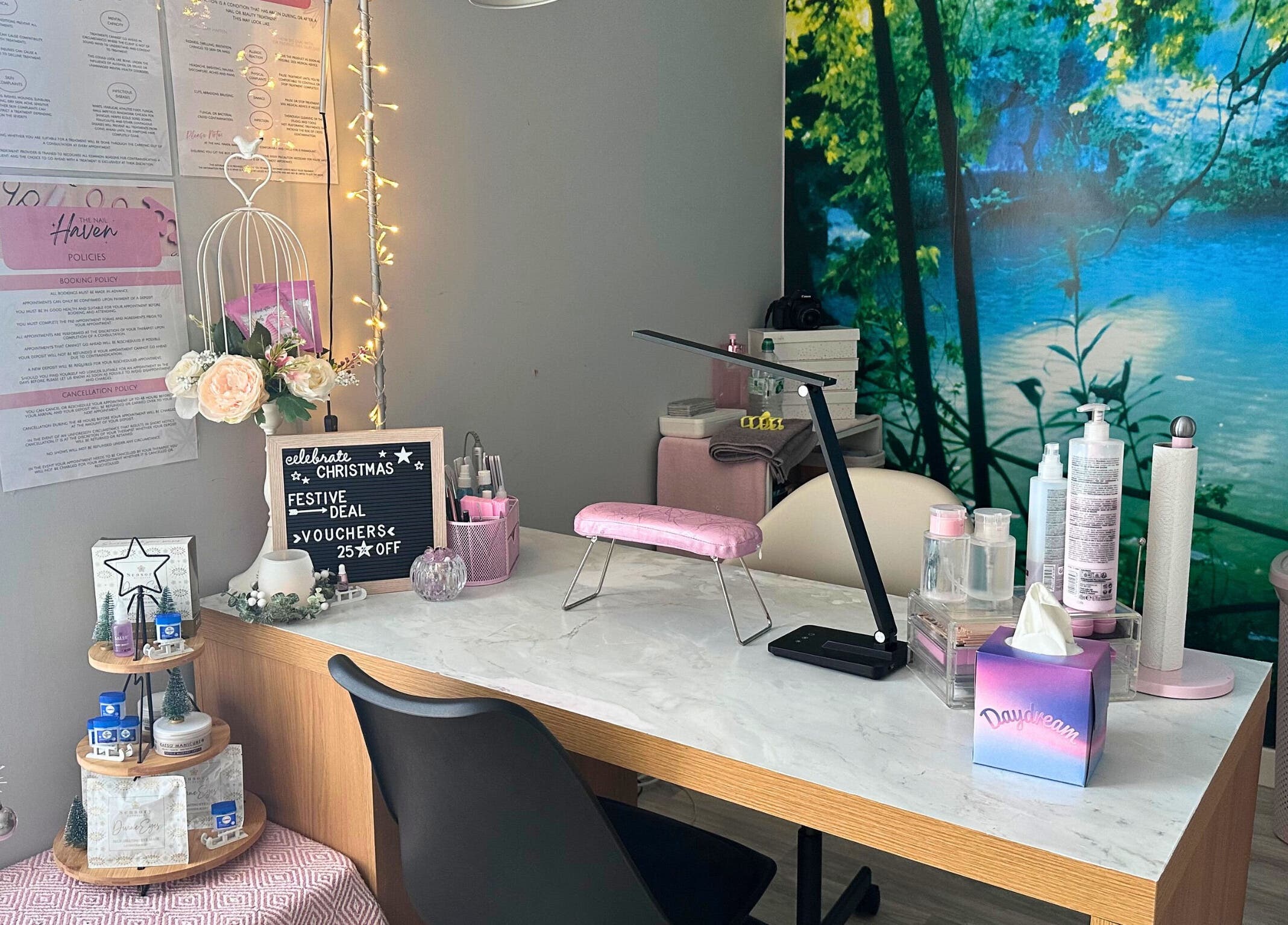 Inviting nail station at The Nail Haven | Barry, featuring elegant decor and foliage mural, Barry, Wales, GB.