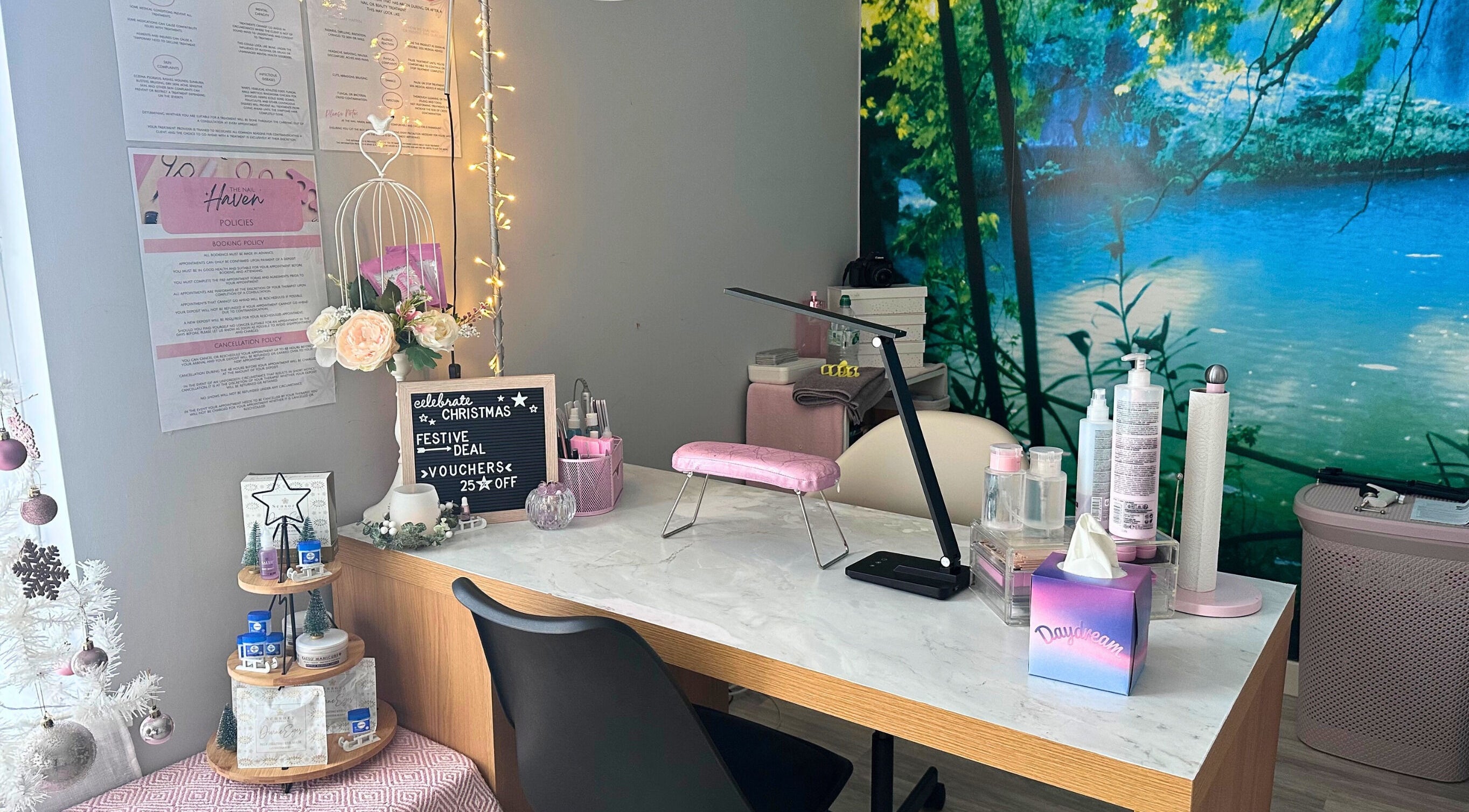 Inviting nail station at The Nail Haven | Barry, featuring elegant decor and foliage mural, Barry, Wales, GB.