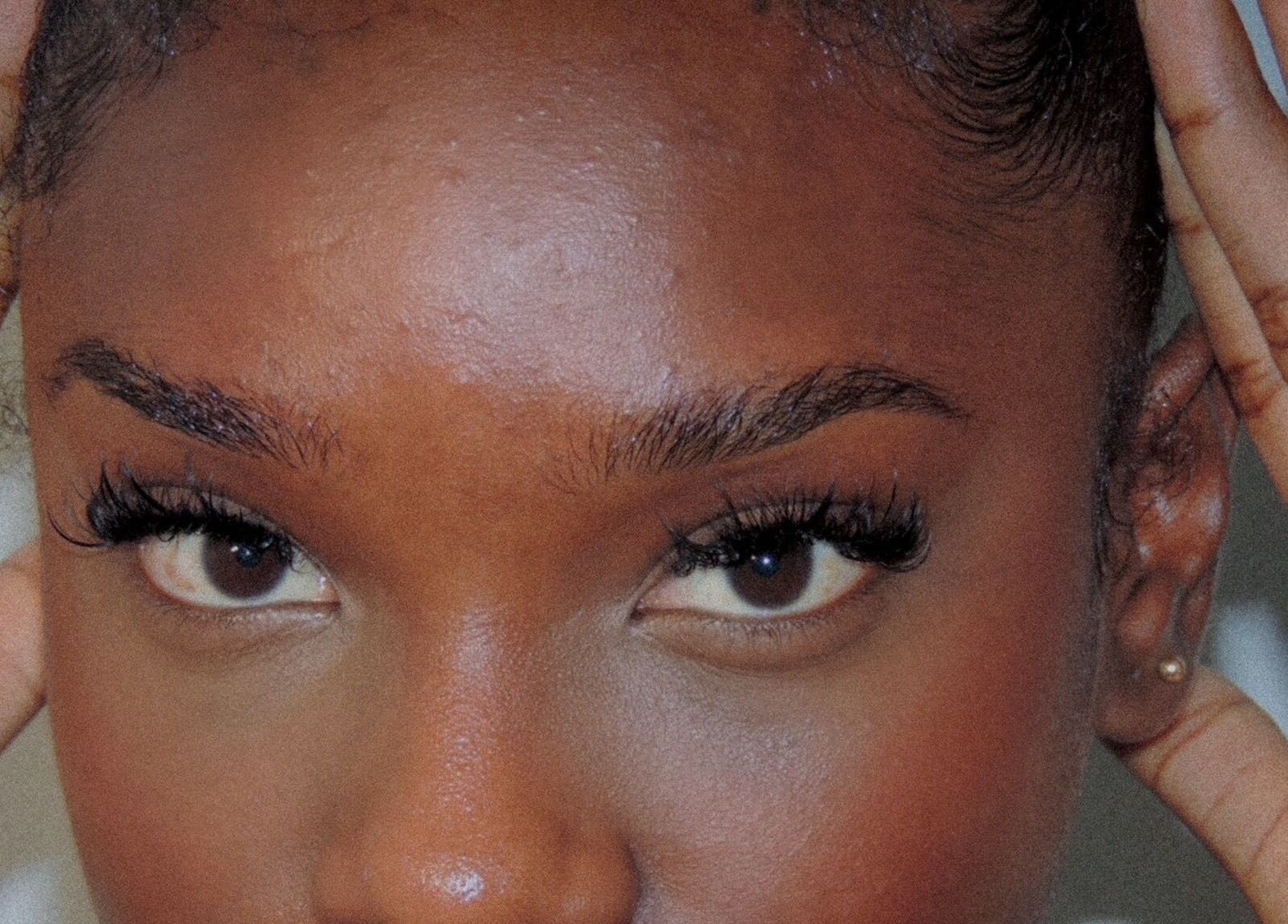 Close-up of elegant eye makeup at D’Luxe Kollection, Cole Bay, Sint Maarten, SX.