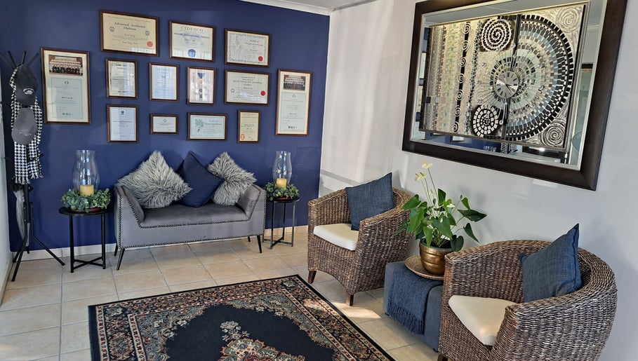 Elegant waiting area with cozy seating at Sharons Massage Studio, Mossel Bay, Western Cape, ZA.