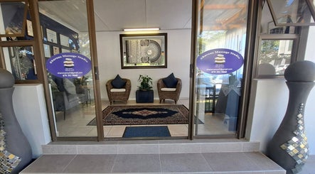 Welcoming entrance of Sharons Massage Studio in Mossel Bay, Western Cape, ZA with cozy seating and decor.