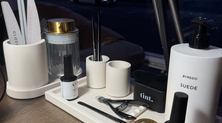 Elegant beauty tools and products at Tanned Professional, Bury, England, GB, showcasing a stylish setup.