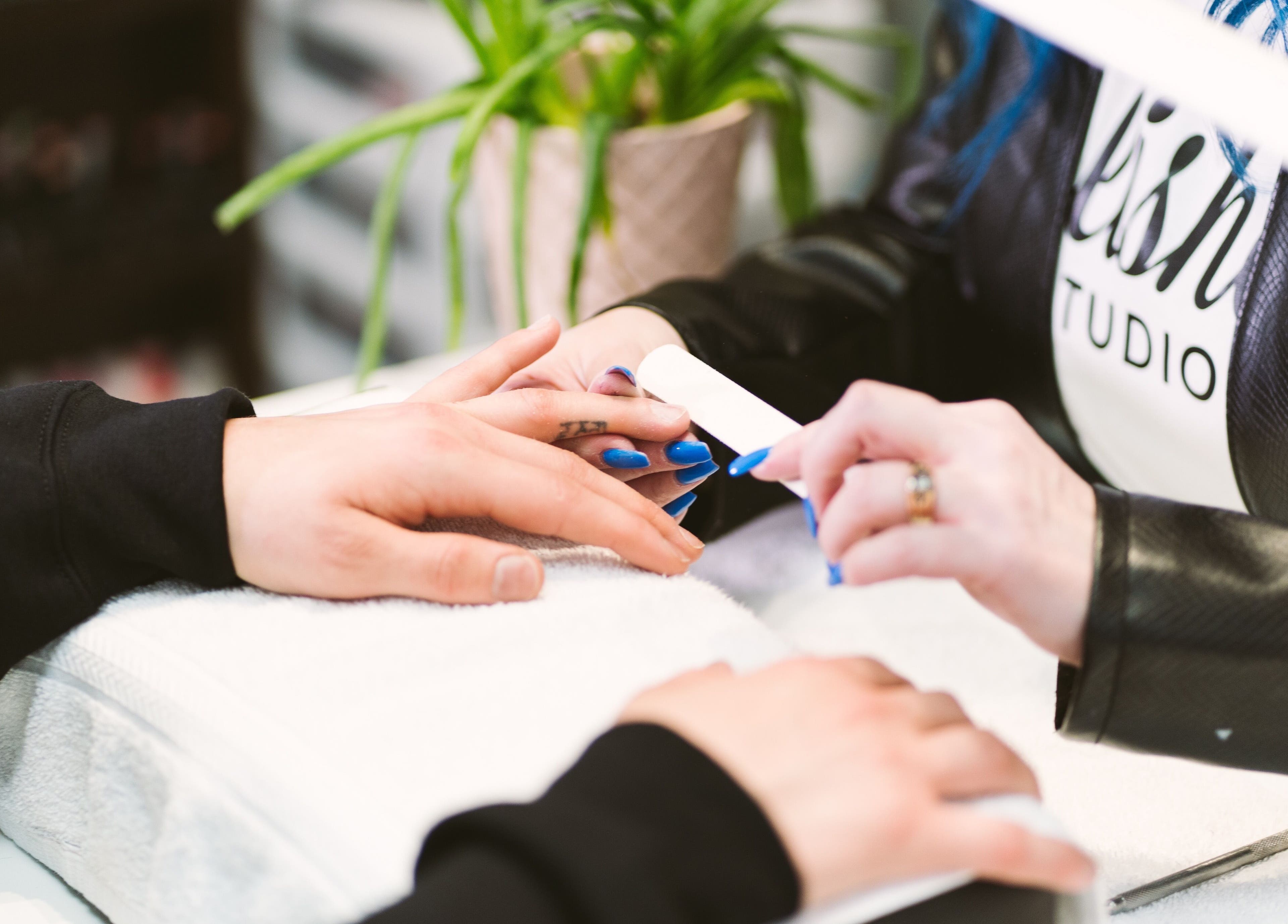 Manicure session at Polished Studio in Torbay, NL, CA showcasing expert nail care.