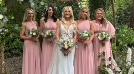 Bridal party at Grainne K Makeup Artist in Derry, Northern Ireland, GB, showcasing bridesmaid style and floral decor.