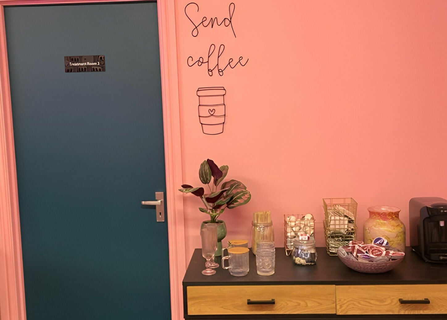 Cozy coffee nook at Gems Beauty, Swindon, England, GB with decor and refreshments.