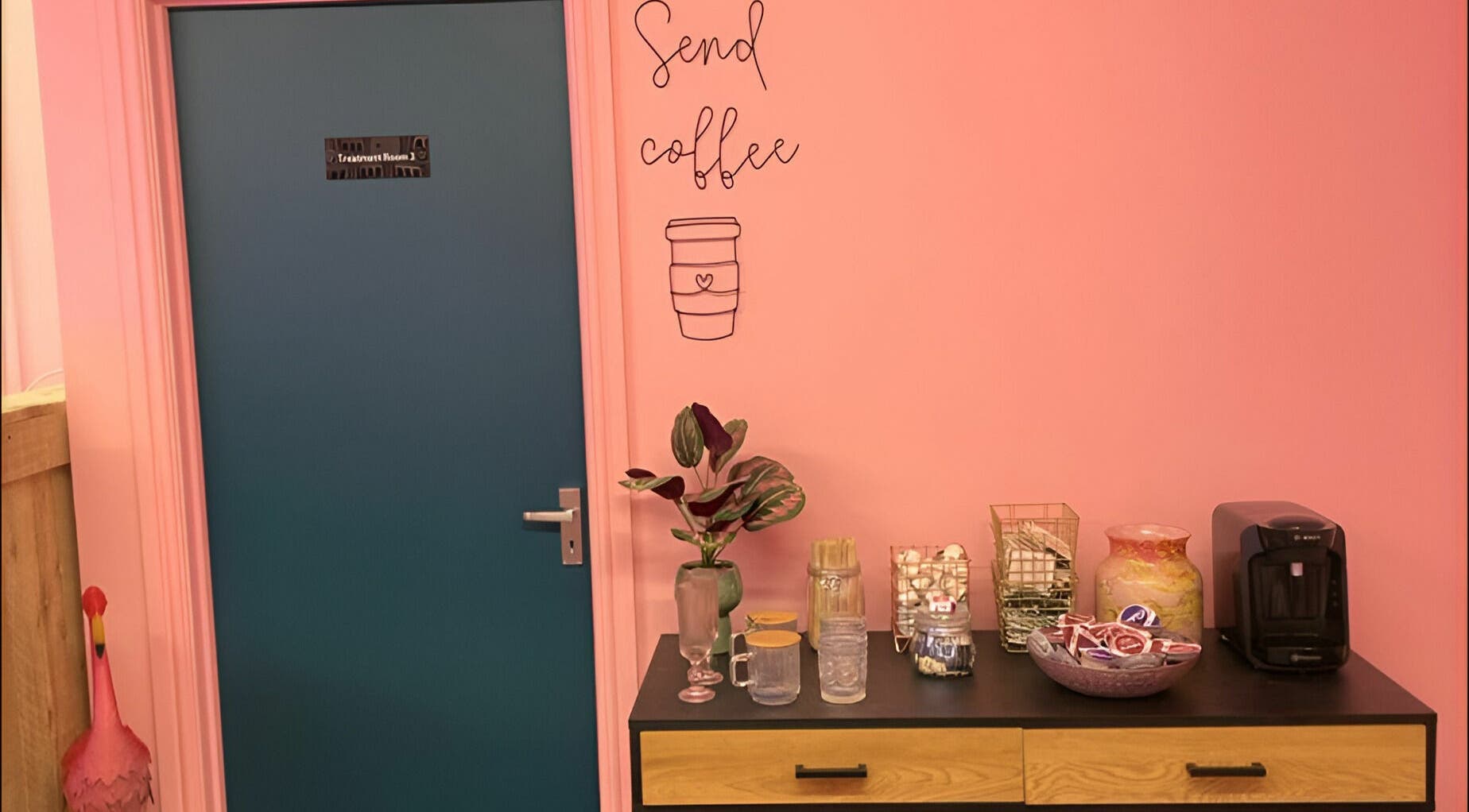 Cozy coffee nook at Gems Beauty, Swindon, England, GB with decor and refreshments.