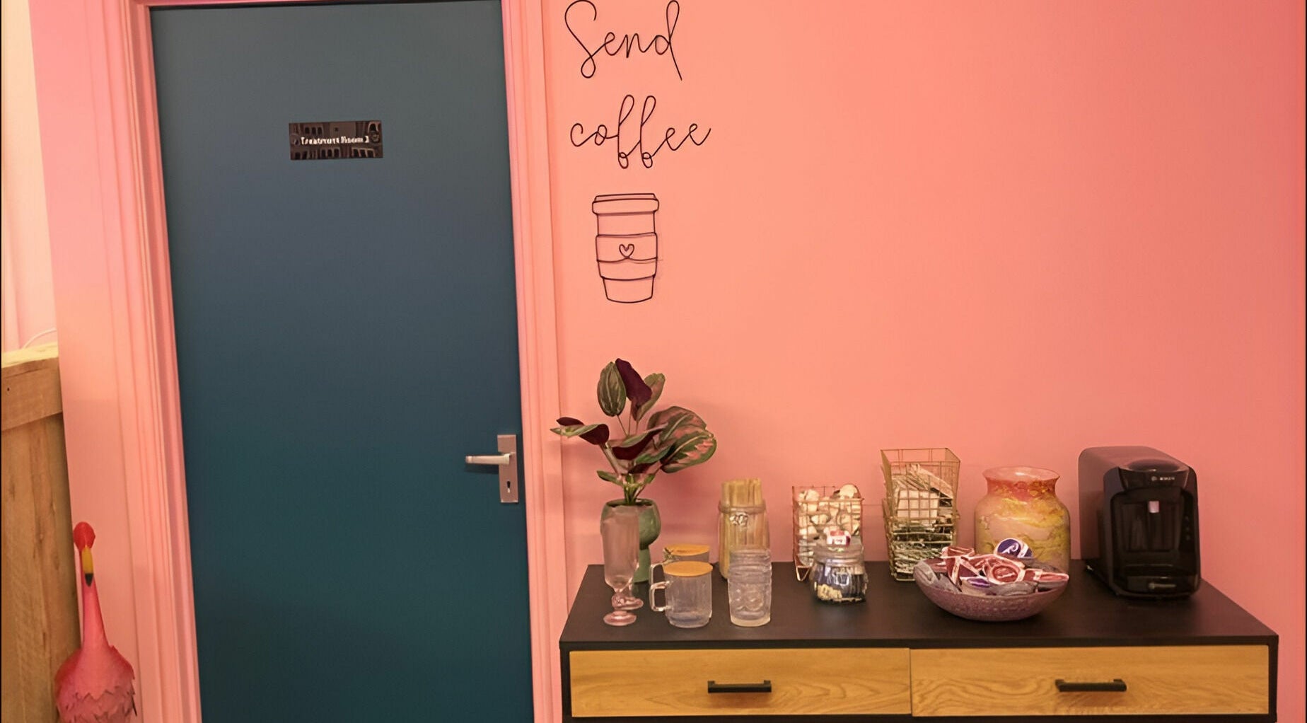 Cozy coffee nook at Gems Beauty, Swindon, England, GB with decor and refreshments.