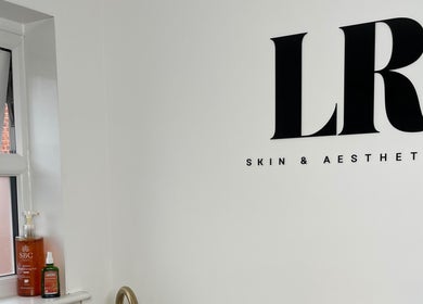 Minimalist decor at LR Skin & Aesthetics, Leicester, England, GB showcasing beauty products and sleek design.