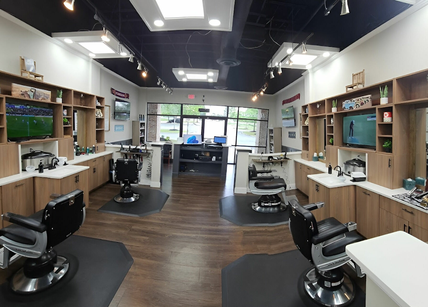 Elegant interior of Lux Barbershop in Alpharetta, Georgia, US featuring stylish barber chairs and modern decor.