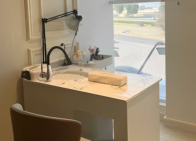 Elegant manicure station at Assort Spa & Beauty Salon, Muscat, Muscat Governorate, OM with natural light.