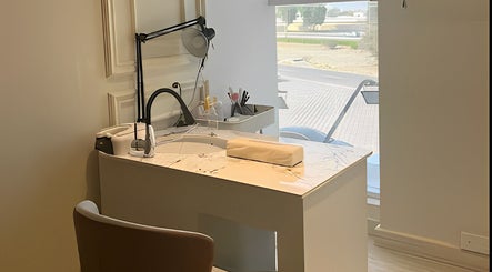 Elegant manicure station at Assort Spa & Beauty Salon, Muscat, Muscat Governorate, OM with natural light.