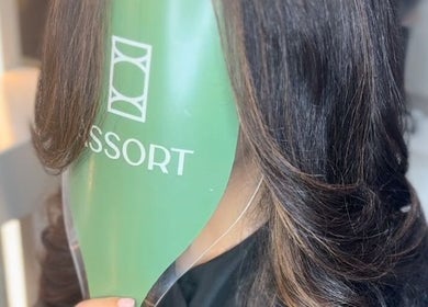 Stylish woman showcases hair at Assort Spa & Beauty Salon, Muscat, Muscat Governorate, OM.