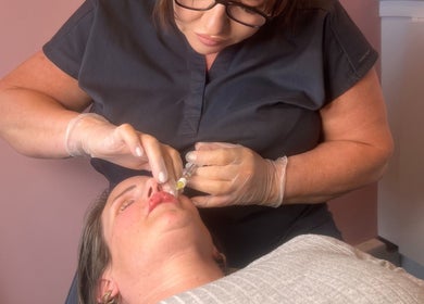 Professional lip filler treatment at Serene Aesthetic Clinic, Poole, England, GB. Enhancing natural beauty.