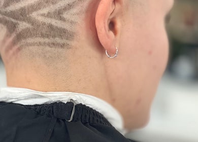 Creative undercut design at Saheed Hair Studio@ Hair Bian, London, England, GB. Modern hair artistry on full display.