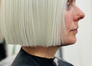 Sleek silver bob hairstyle at Saheed Hair Studio@ Hair Bian, London, England, GB. Modern and stylish.