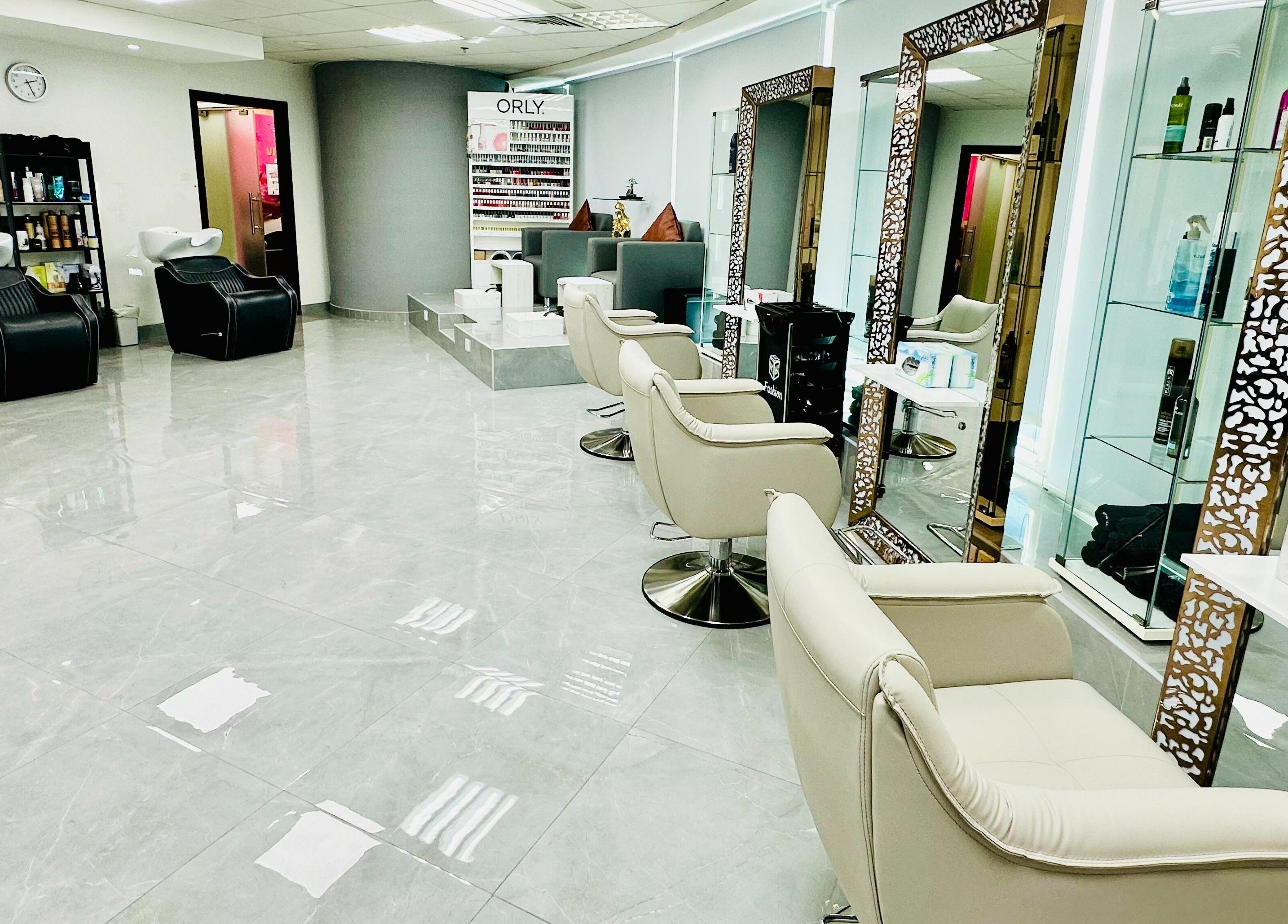 Ultimo Capelli Beauty Centre DMCC interior showcasing luxury salon chairs in Dubai, Dubai, AE.
