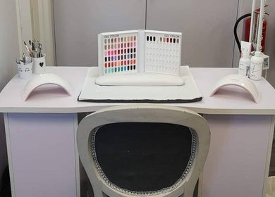 Gel nail station at House of Hair, Nottingham, England, GB with color samples and tools.