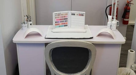 Gel nail station at House of Hair, Nottingham, England, GB with color samples and tools.