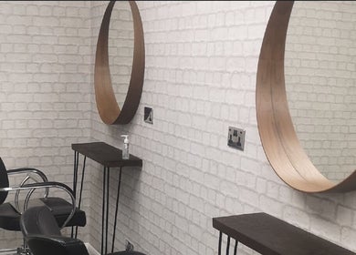 Elegant salon mirrors and chairs at House of Hair, Nottingham, England, GB.