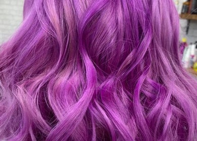 Stylish purple hair at House of Hair, Nottingham, England, GB showcasing bold color and expert styling.