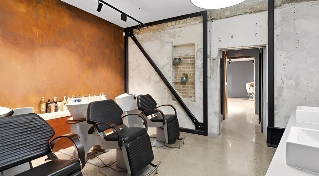 Modern salon chairs at Revival Hair Design, Huntly, Waikato, NZ showcasing stylish interior design.