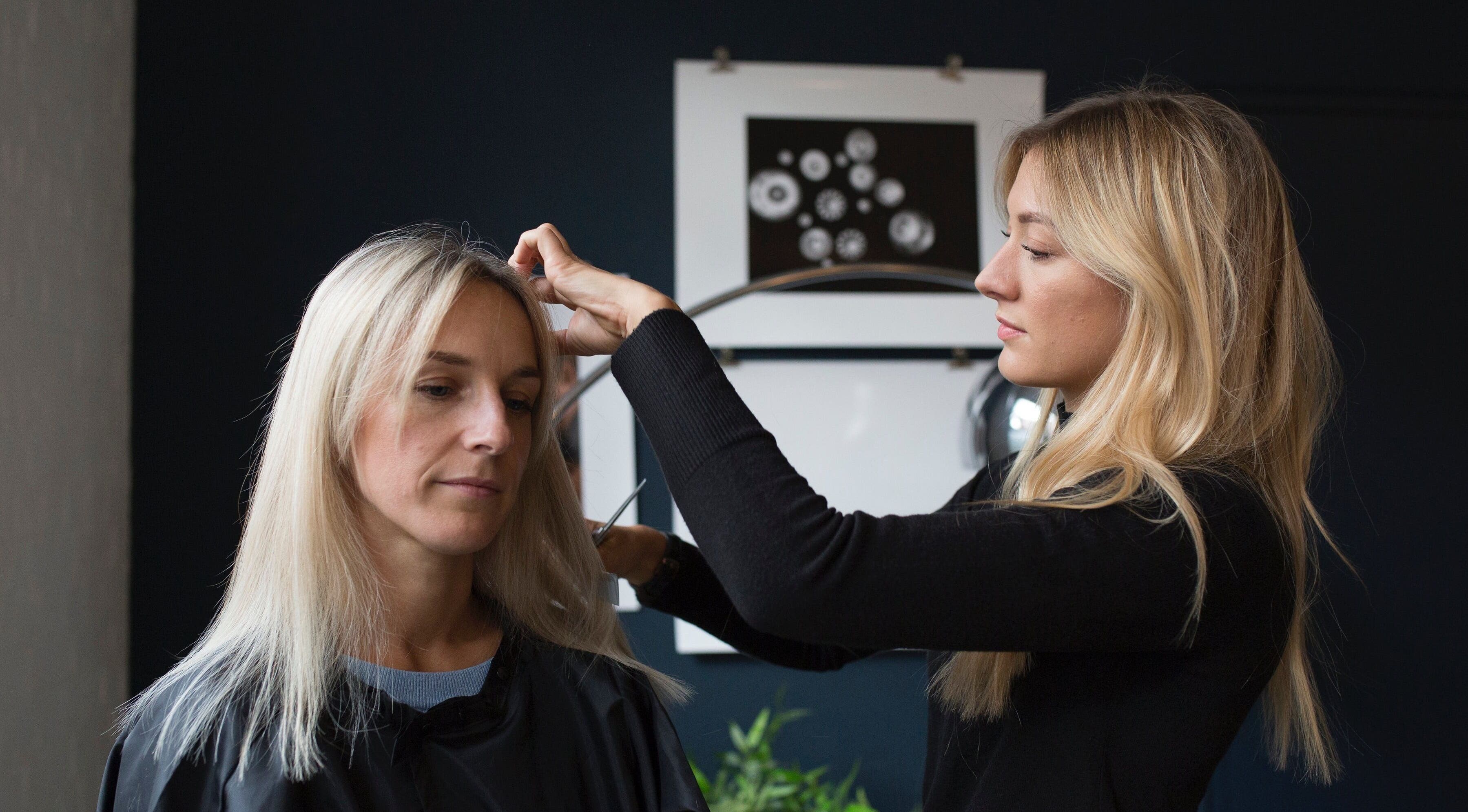 Professional haircutting at Salon Chatsworth Road E5 in London, England, GB with expert stylists.