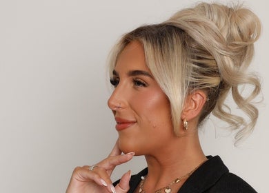 Woman with styled hair and natural makeup at Filled with Love Aesthetics, Coventry, England, GB.