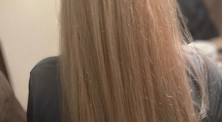 Smooth, straight blonde hair at Shear Style Salon (Beauty Break by Des), Sheridan, Arkansas, US.