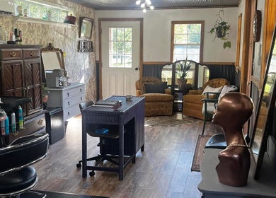 Inviting interior of The Pampered Pearl Salon, Beauty Break by Des, in Poyen, Arkansas, US, featuring stylish decor.