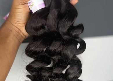 Luxurious curly hair bundle from Pretty Girl Gang Luxurious Hair & Minks Collection, St. Catherine, JM.