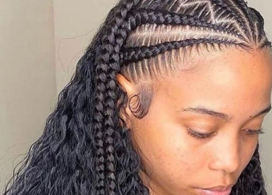 Intricate braided hairstyle at Loc’d In Hair Studio, St. Catherine, JM showcasing expert styling and design.