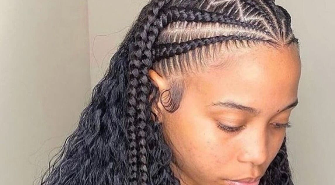 Intricate braided hairstyle at Loc’d In Hair Studio, St. Catherine, JM showcasing expert styling and design.