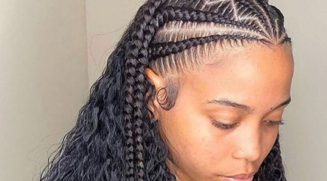 Intricate braided hairstyle at Loc’d In Hair Studio, St. Catherine, JM showcasing expert styling and design.
