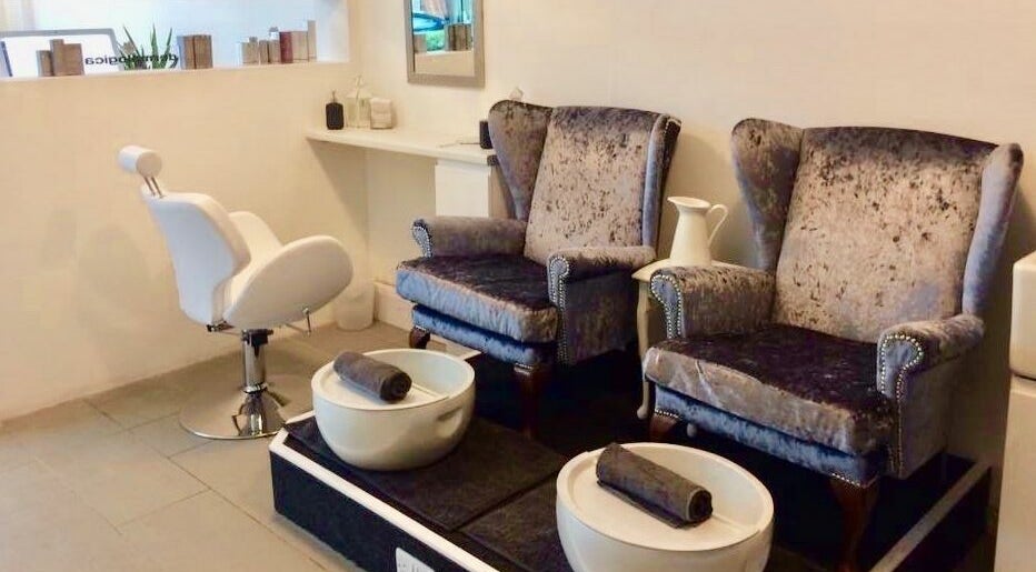 Luxurious pedicure seating at Skin Squared, Whiteley, England, GB. Elegant chairs beside modern pedicure bowls.