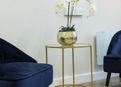 Chic navy chairs and gold table in Be You Wetherby, a beauty venue in Wetherby, England, GB.