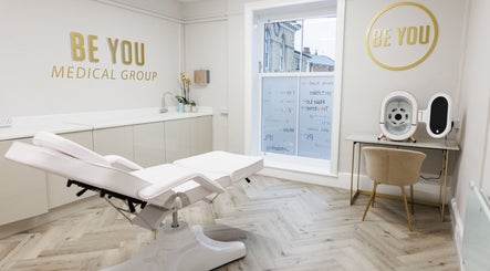 Modern treatment room at Be You Wetherby, Wetherby, England, GB featuring a reclining chair and stylish decor.