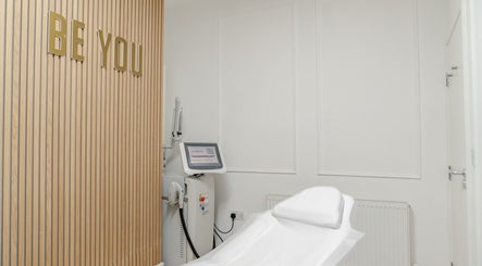 Modern treatment room at Be You Leeds in Leeds, England, GB, featuring sleek design and advanced equipment.