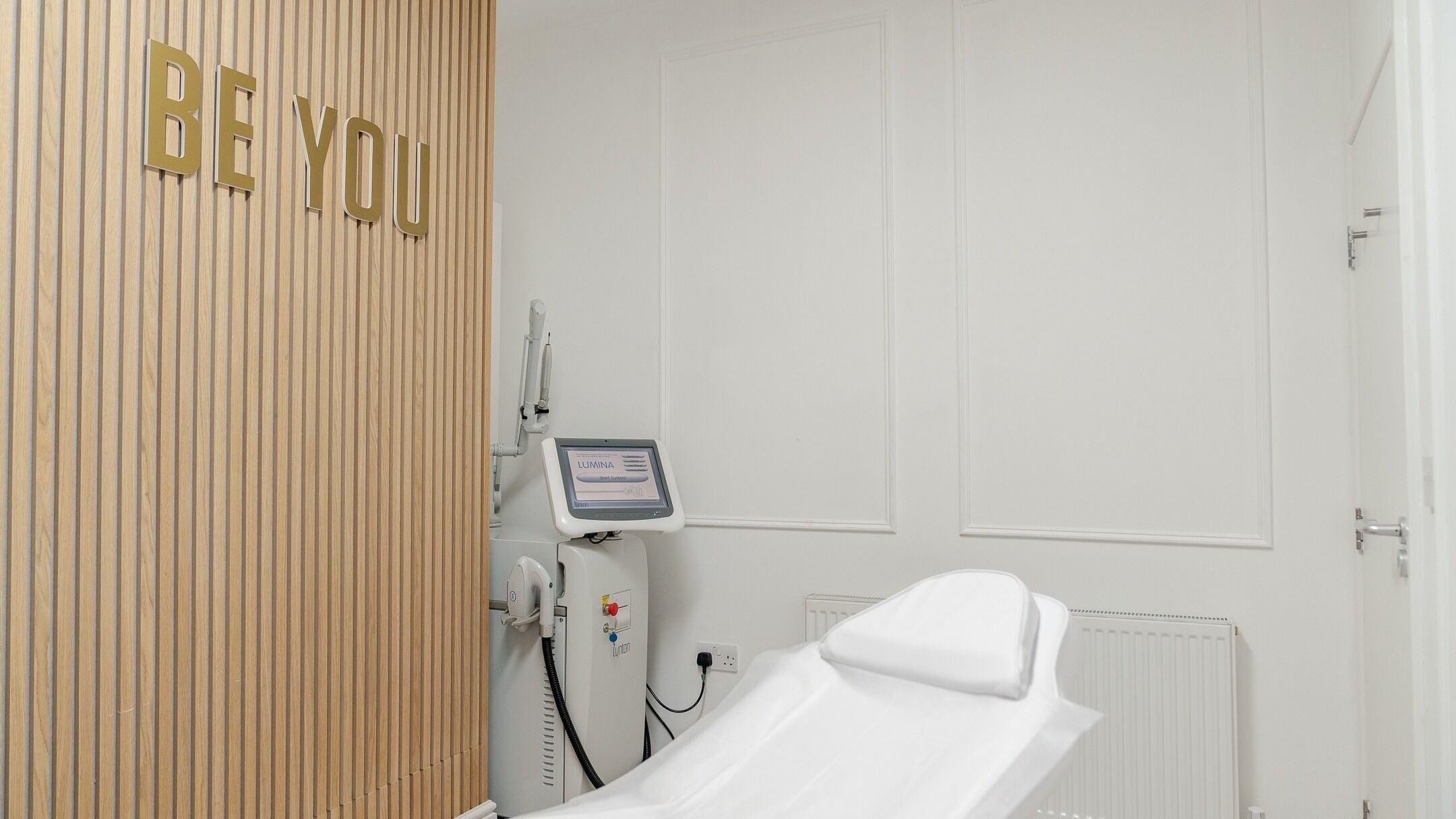 Modern treatment room at Be You Leeds in Leeds, England, GB, featuring sleek design and advanced equipment.