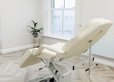 Modern treatment room at Be You Wetherby, Wetherby, England, GB, featuring an adjustable therapy chair.