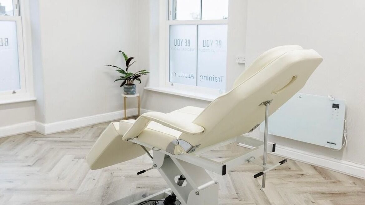 Modern treatment room at Be You Wetherby, Wetherby, England, GB, featuring an adjustable therapy chair.