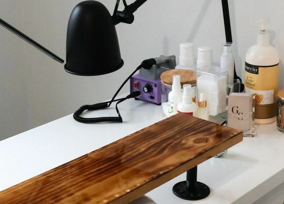 Nail station setup at Studio Kay Belle, Montréal, Québec, CA, showcasing tools and decor.