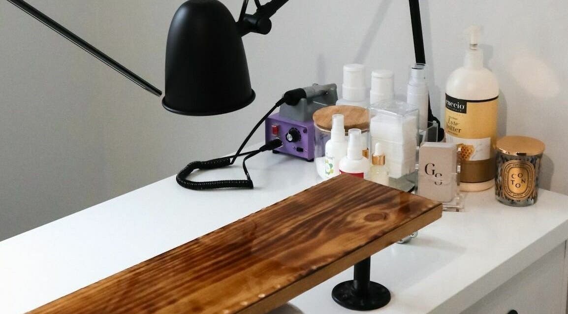 Nail station setup at Studio Kay Belle, Montréal, Québec, CA, showcasing tools and decor.