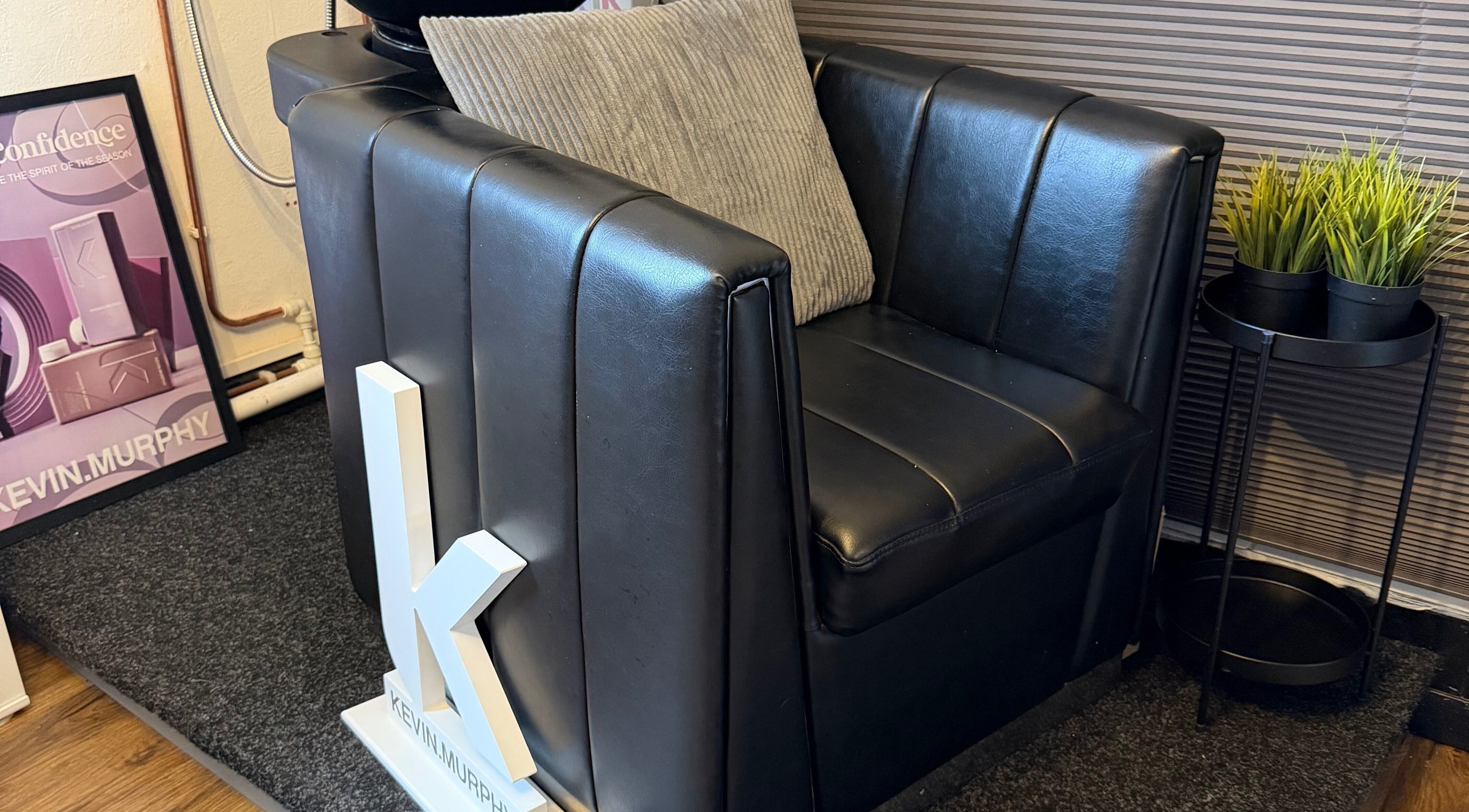 Stylish seating area at The Colour Room, Alcester, England, GB, showcasing modern comfort and elegance.