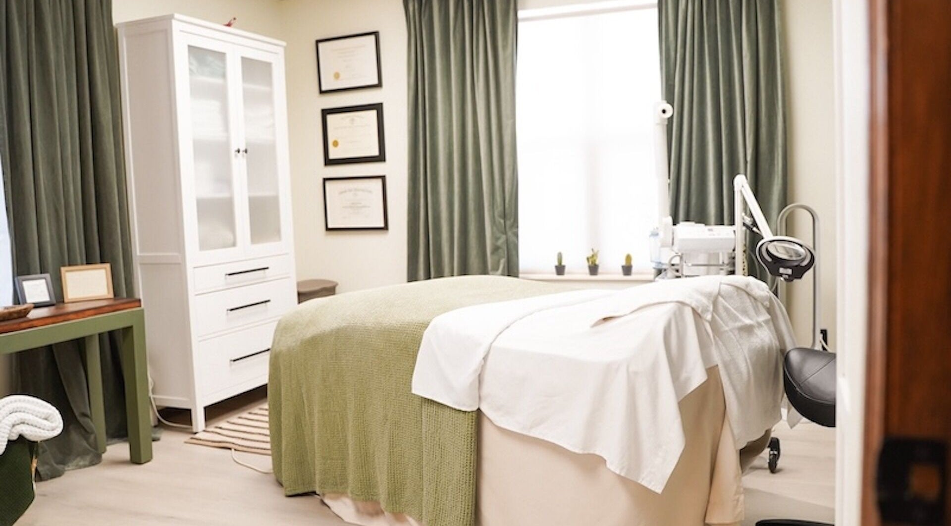 Tranquil spa room at Face to Face in Pueblo, Colorado, US with a cozy bed and calming decor.