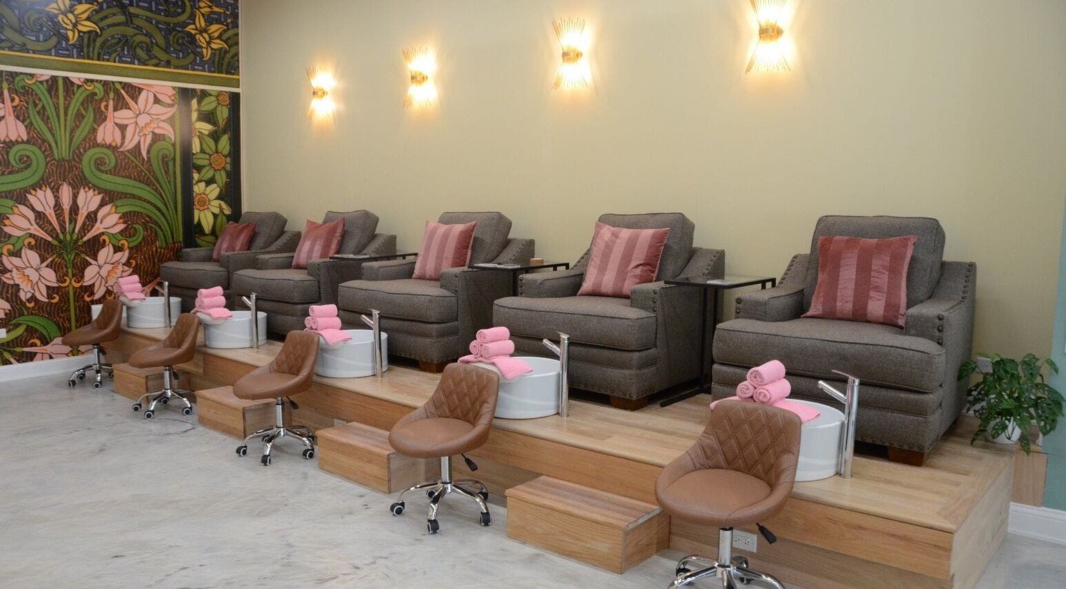 Luxurious pedicure chairs at Simone's Nail Lounge, Chicago, Illinois, US, featuring stylish decor and comfort.