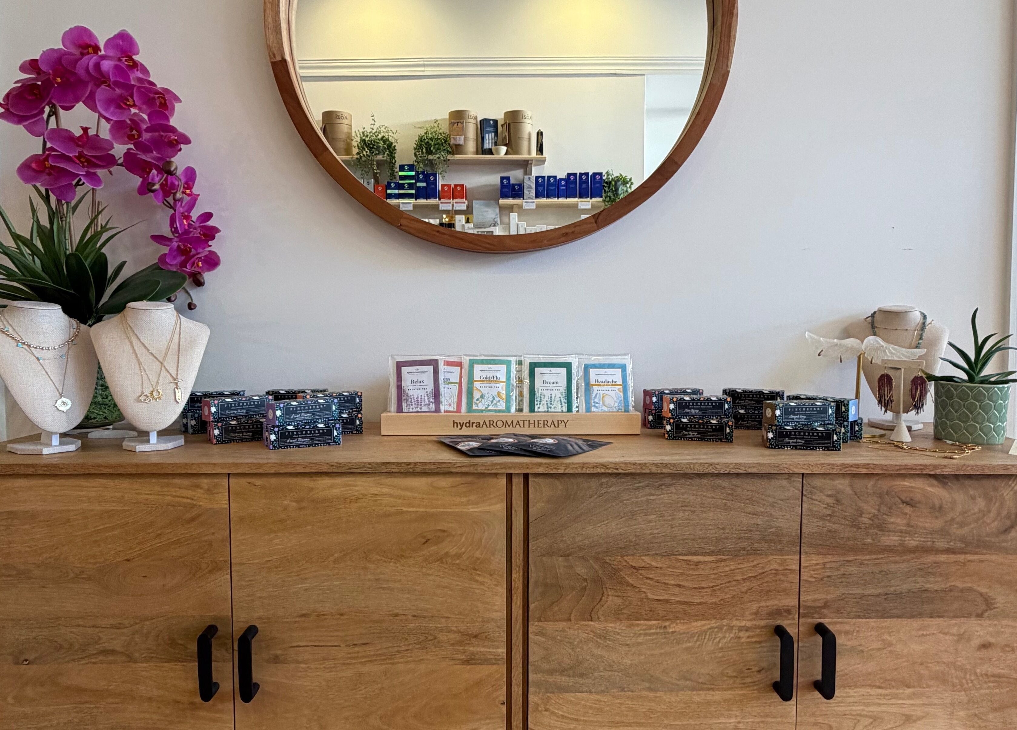 Glowinskin Esthetics vanity with jewelry and decor, Sea Cliff, New York, US.