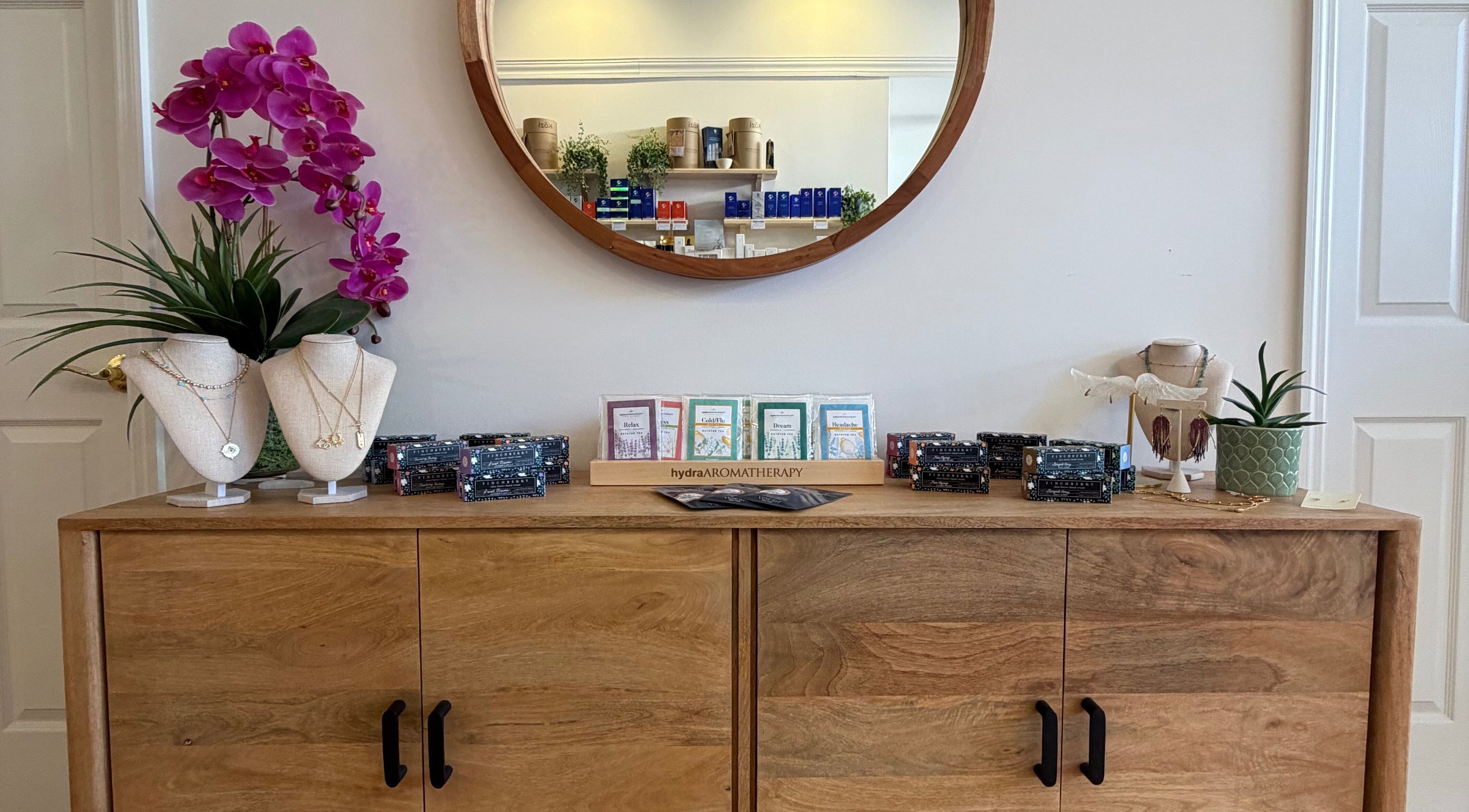 Glowinskin Esthetics vanity with jewelry and decor, Sea Cliff, New York, US.