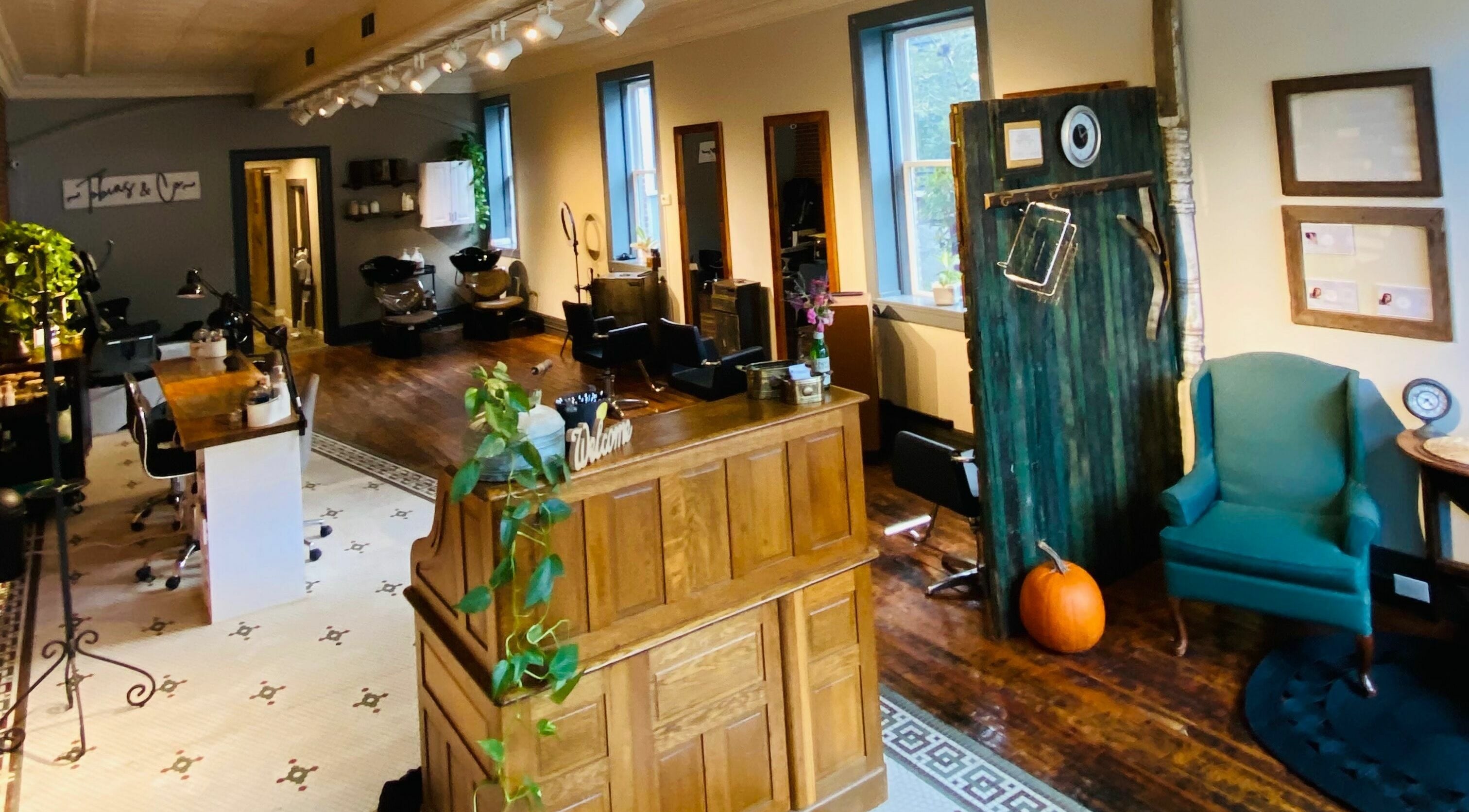Tobias & Co. Salon interior with wooden decor and seating in Hammondsport, New York, US.