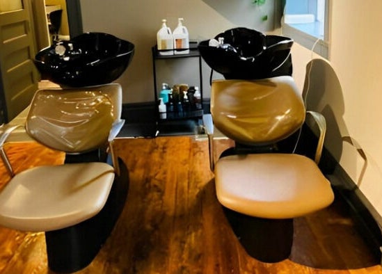 Modern salon wash station at Tobias & Co. Salon in Hammondsport, New York, US offering luxury hair care.
